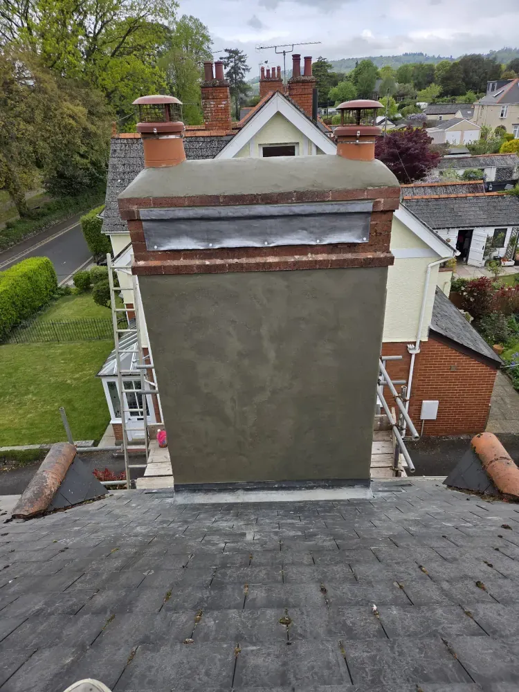 Chimney stack rendered and re-flashed with new lead at the roof junction